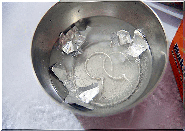 clean silver objects with aluminum foil