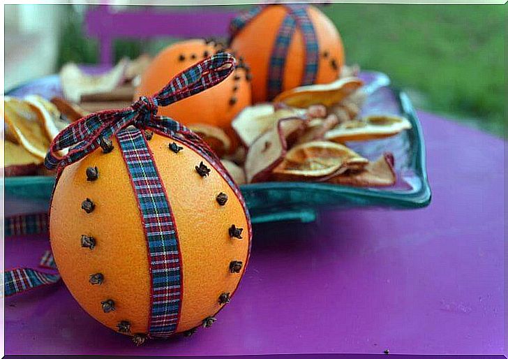 perfume your home with cloves planted in an orange