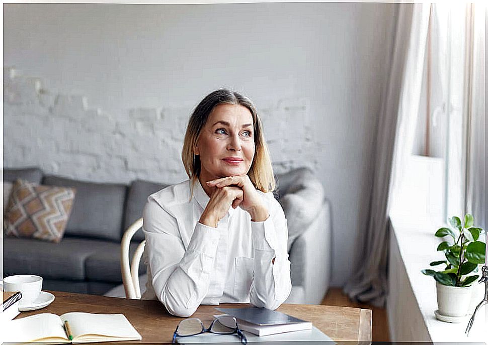 A woman thinking about how to adopt a healthy habit