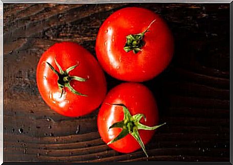 Three beautiful tomatoes.