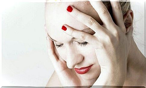 A woman with headache.